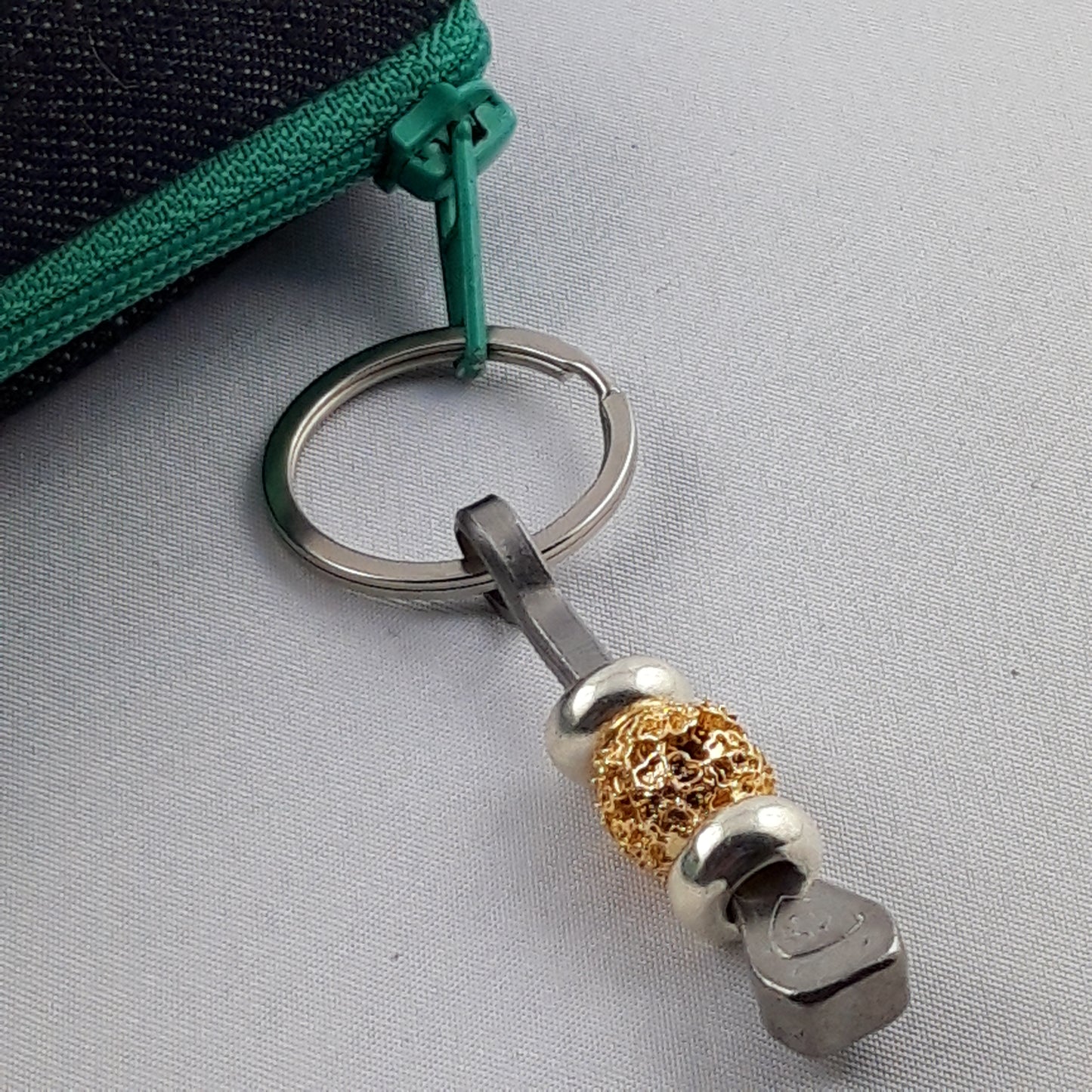 Glücksbringer mit Hufnagel mit Metallperle